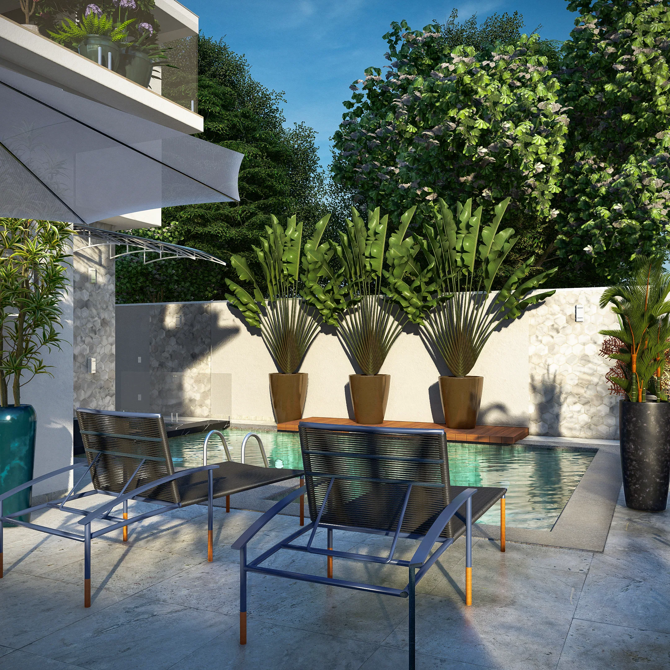 Poolside area with lounge chairs, potted bird-of-paradise plants and flowering trees framing the space