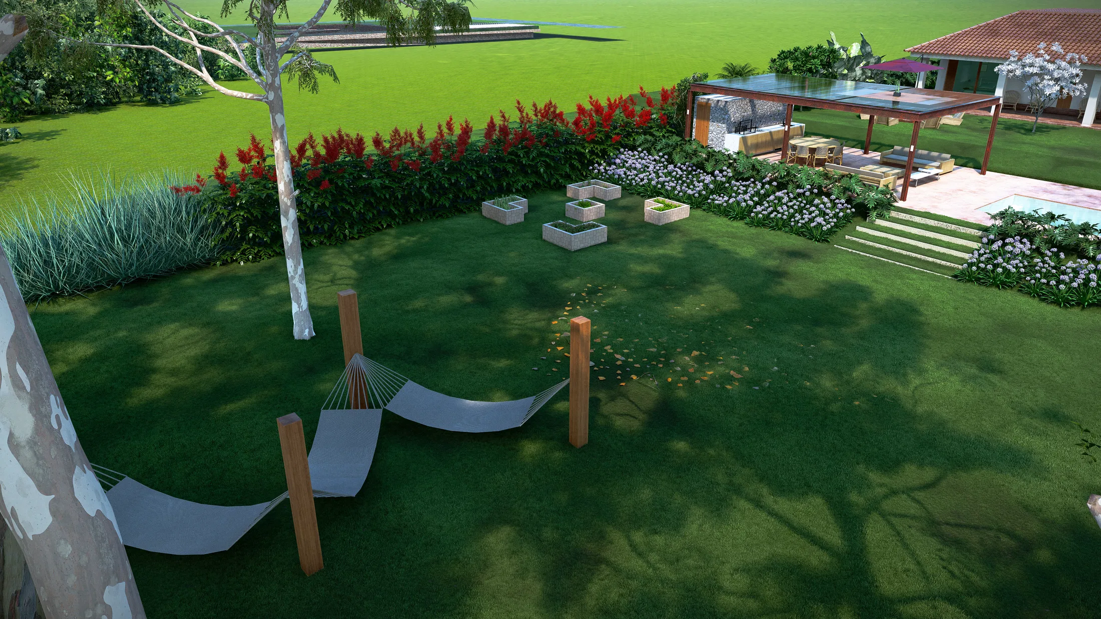 Elevated view of the back garden with a hammock between timber posts, a bed of red salvias, concrete cube planters and a lounge pergola beyond.