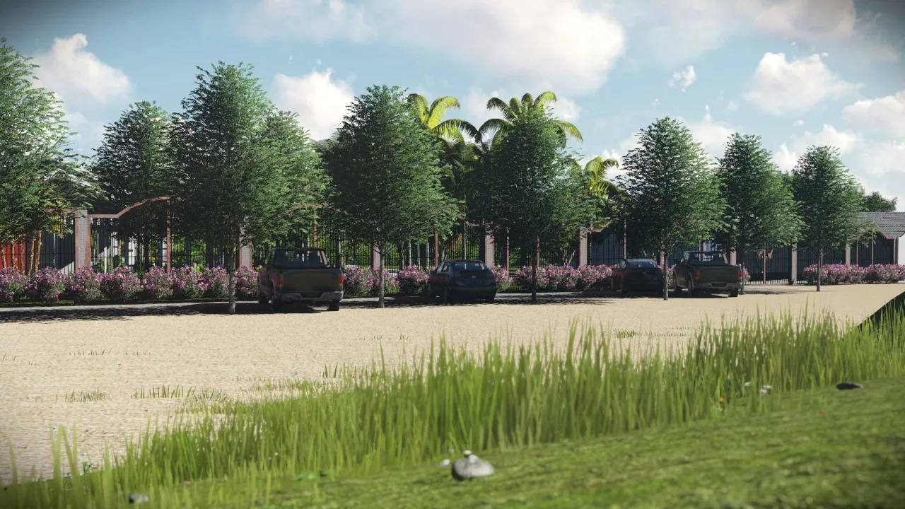 Parking area beneath a row of trees and flowering shrubs, with cars lined up near the approach to the houses