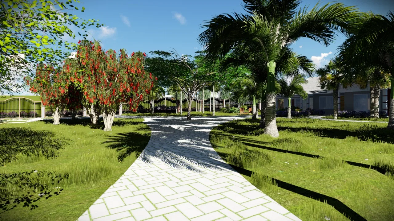 Geometric-paved trail flanked by red-flowering trees, leading toward the residences in the distance