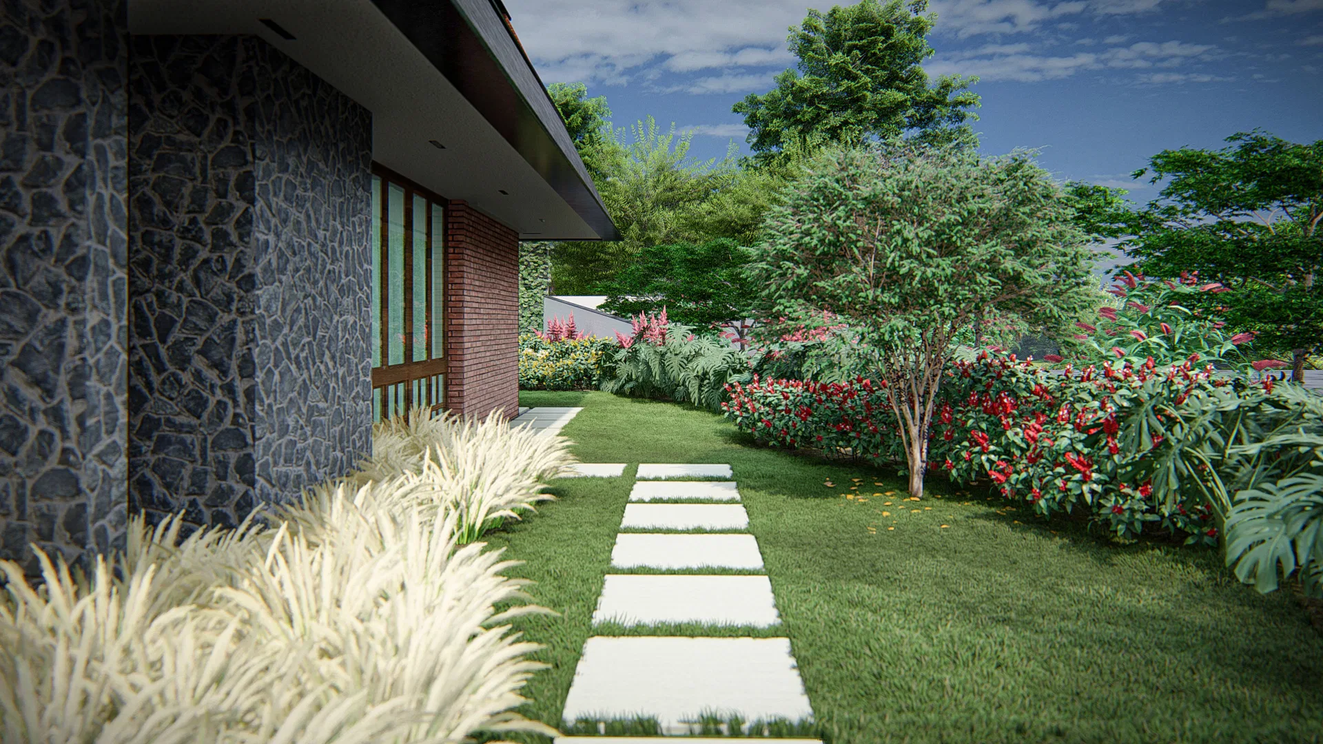 Path of stone pavers set in the lawn, lined by red-flowering shrubs and a tree beside the house wall