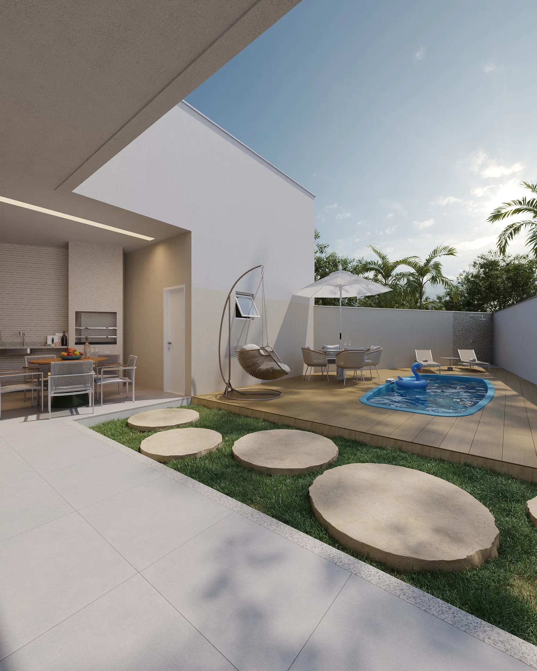 Elevated view of the backyard with a wood deck, a hanging chair, a table with a white umbrella and a pool with a swan-shaped float
