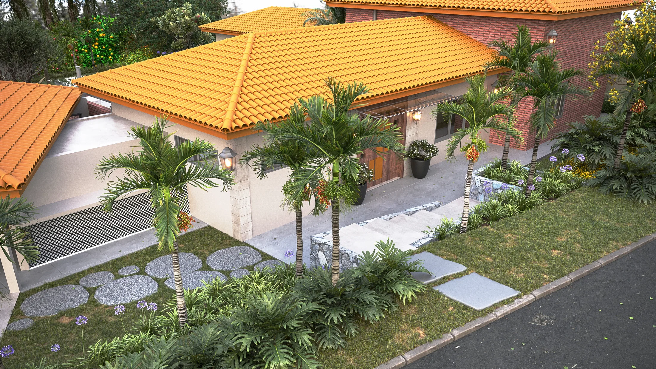 Raised angle of the front garden with palms bearing orange fruit, circular paving stones, flowering agapanthus and tropical foliage against the façade.