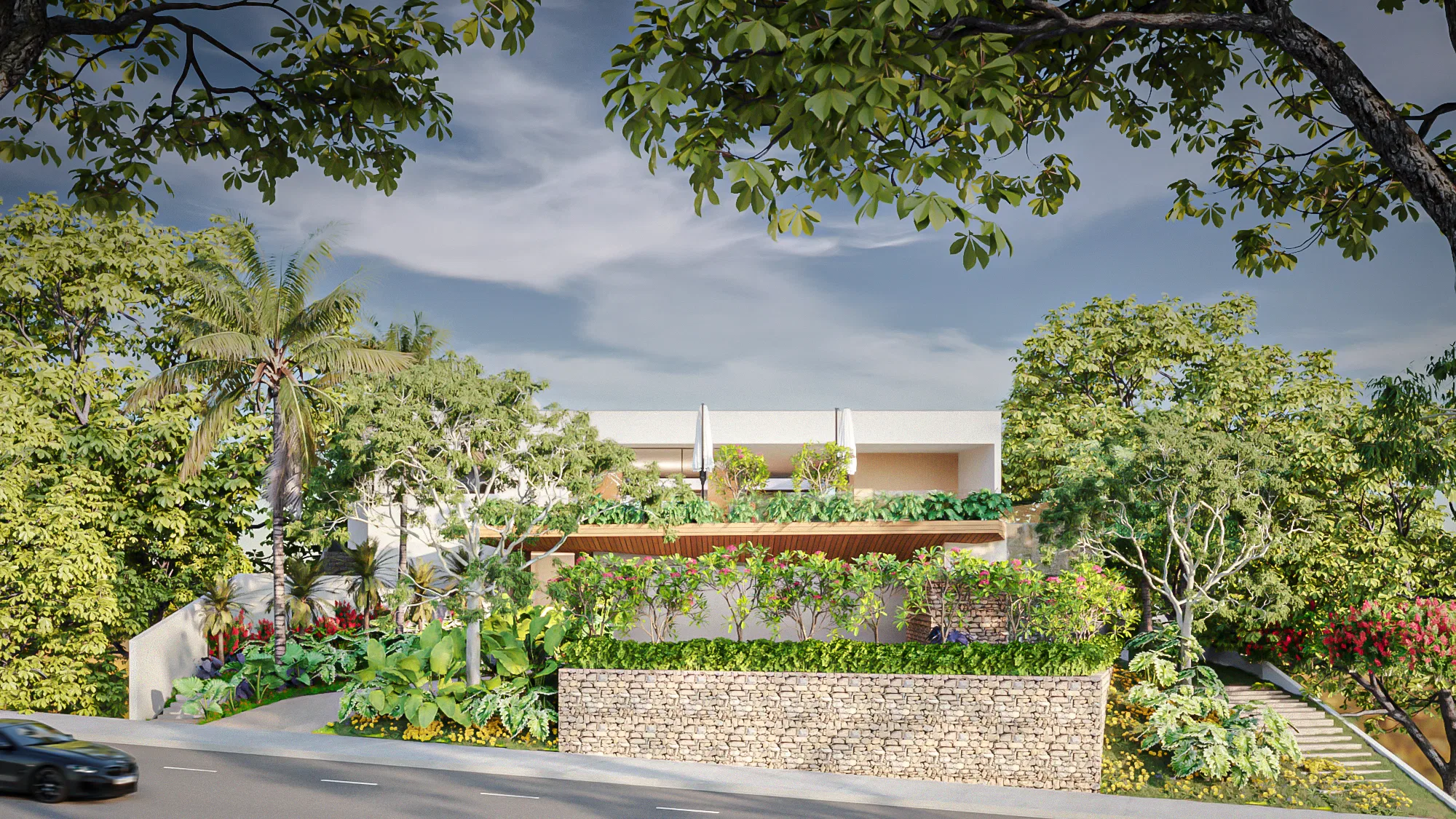 Street view of the facade, partly screened by trees and a stone wall with flowering planters on the rooftop