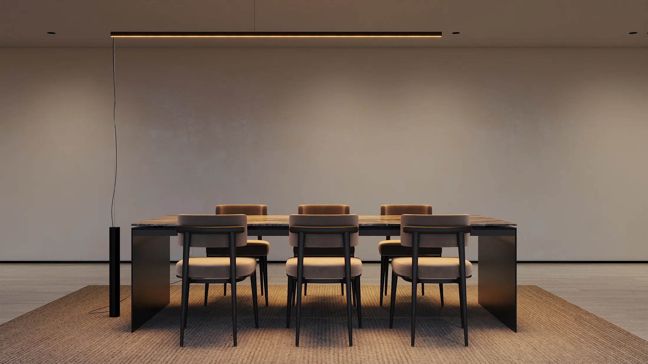 Dining table with six upholstered chairs against a plain light-colored wall, lit by a linear suspended light line above the tabletop.