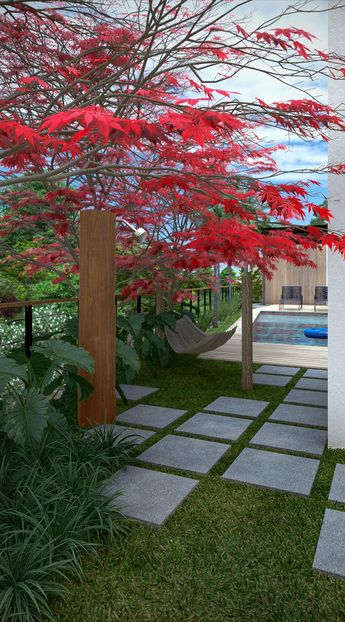 Concrete-paver path across the lawn beneath a red-leaved maple, with a slung hammock and the pool beyond