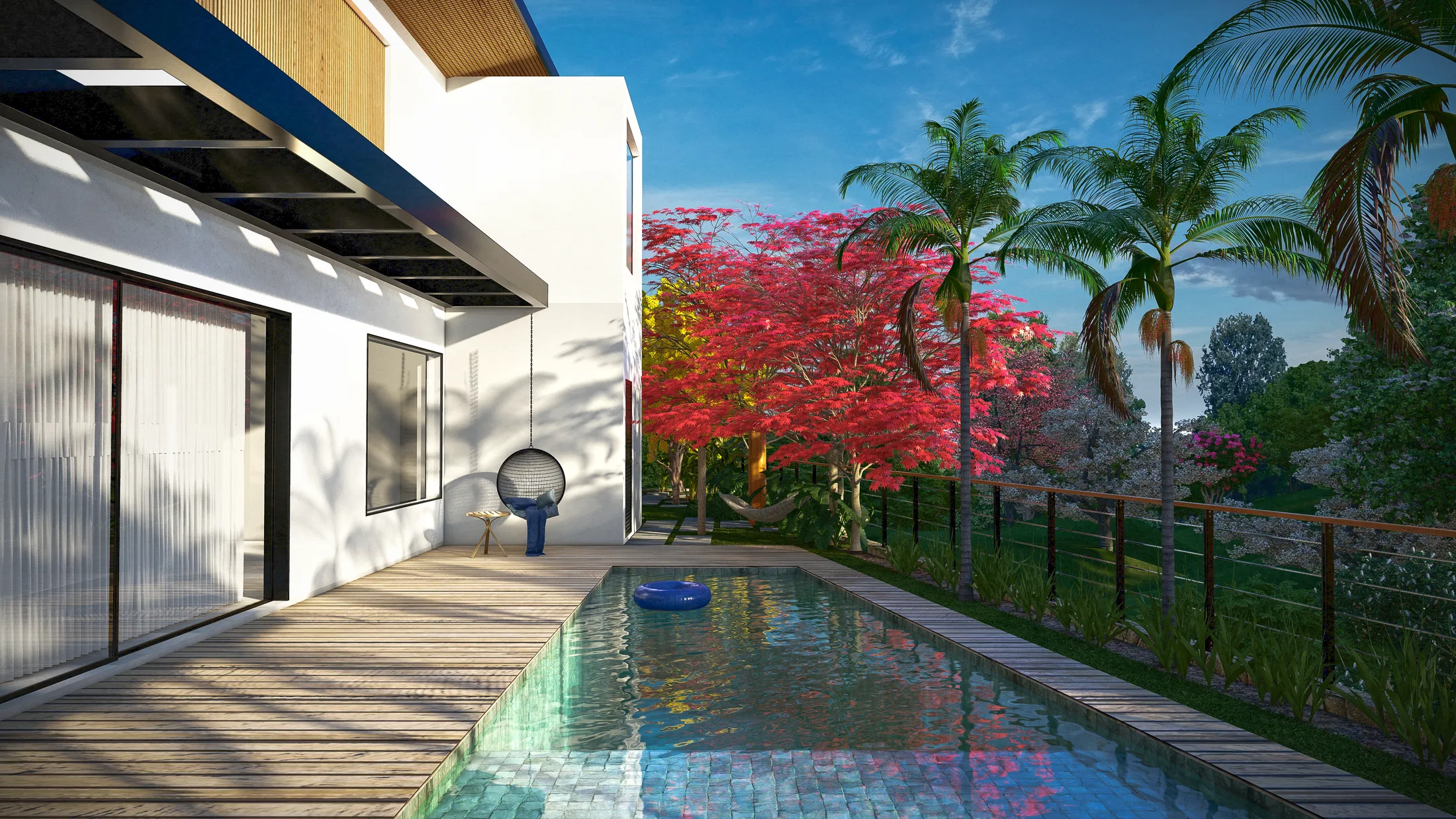Pool deck with a blue hanging chair and outdoor lounge, backed by flowering trees and palms above the boundary railing
