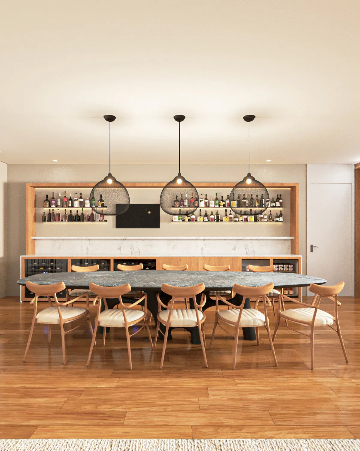 Detail of the bar counter and equipped kitchen in Birdie Apartment, showcasing wooden finishes and recessed lighting.