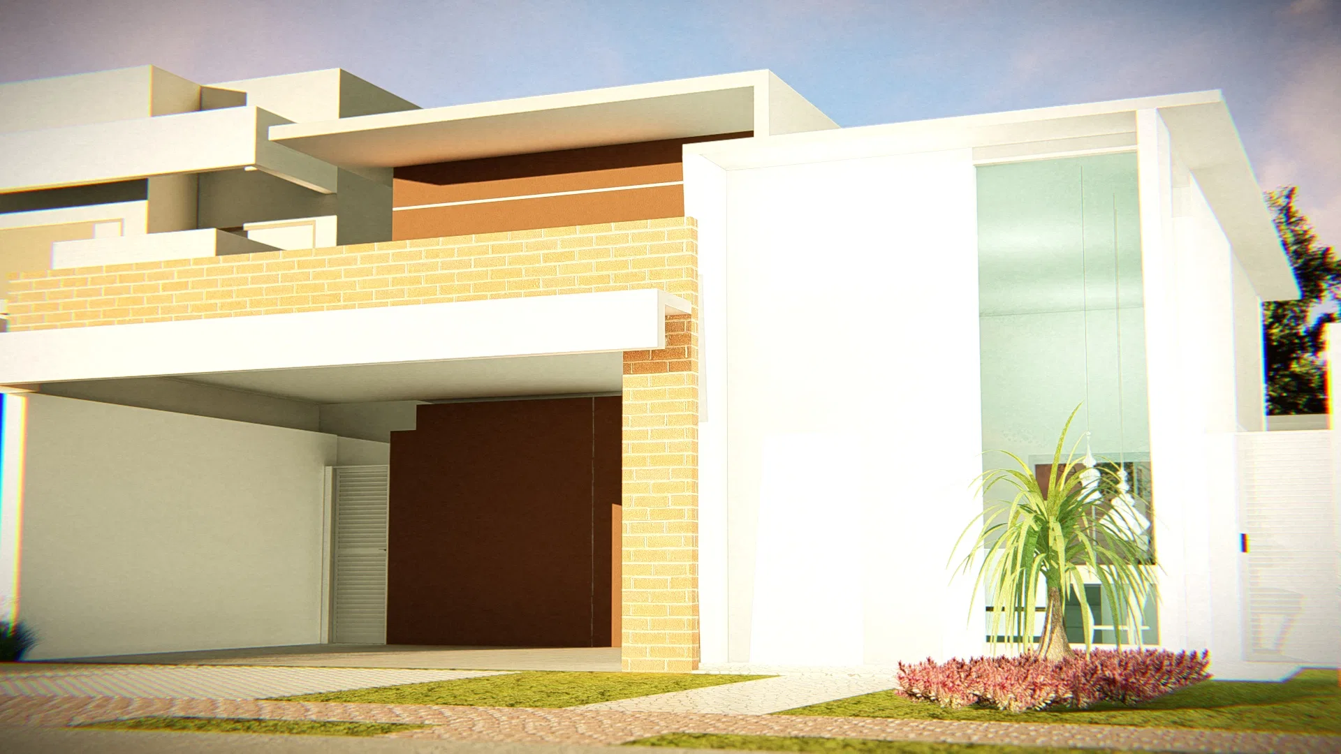 Closer view of the façade, with white volumes, a yellow-clad wall and a glass corner, a dracaena and a bed of pink flowers at its base