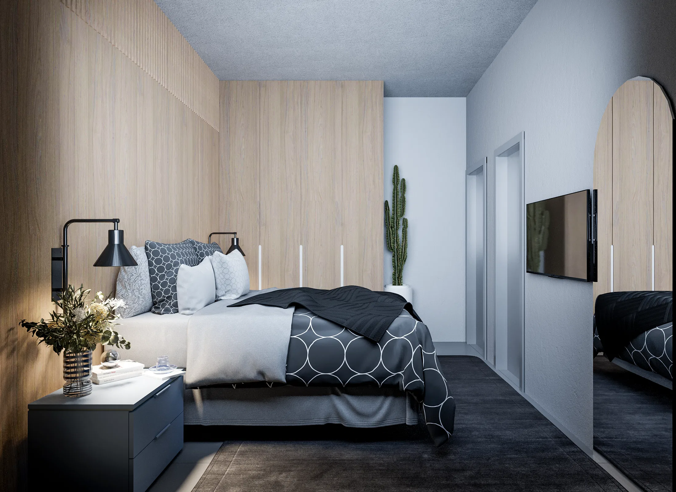 Bedroom with a slatted wood panel, a double bed with graphic-pattern bedding and a cactus plant beside it