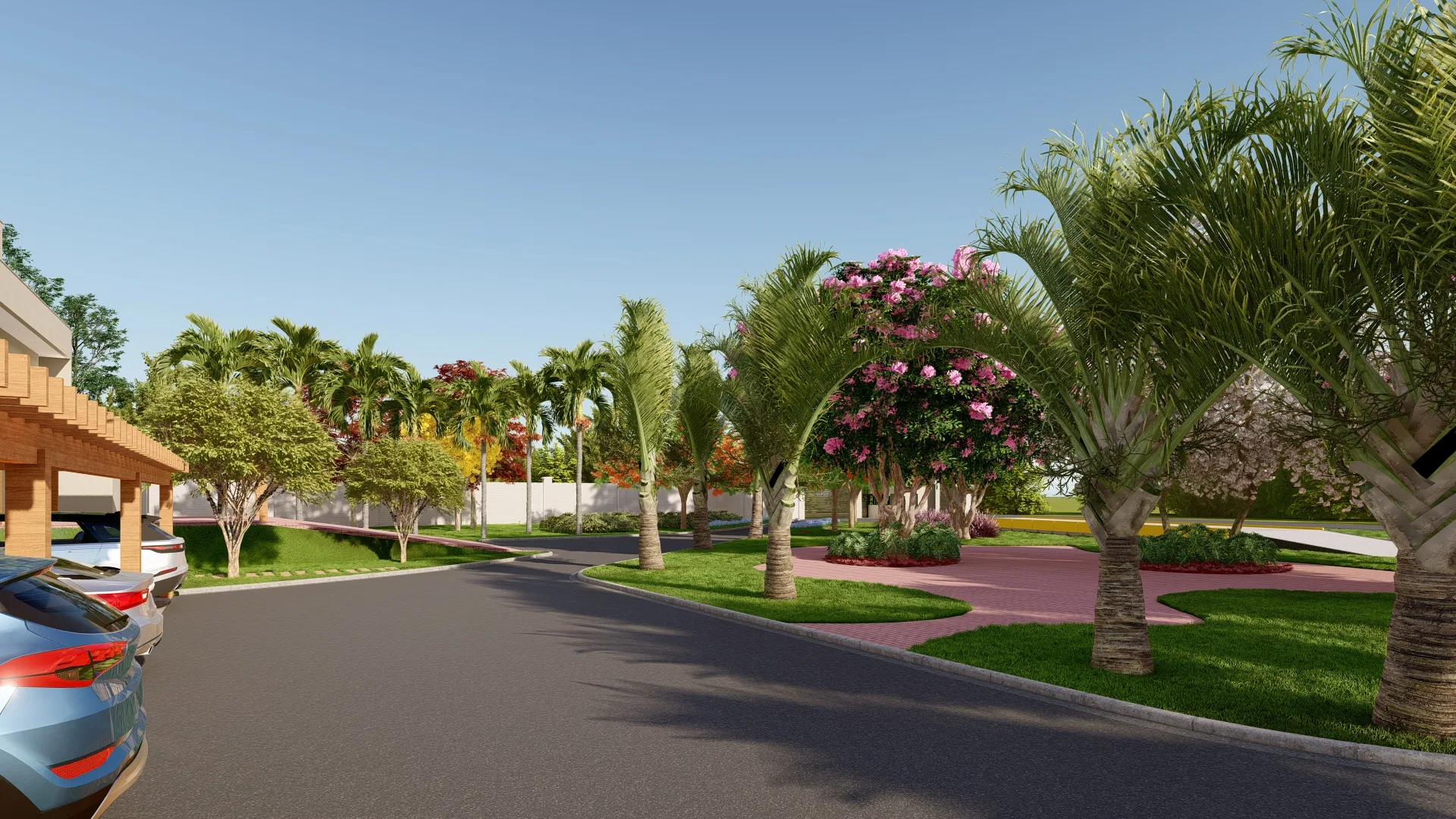 Condominium inner street lined with royal palms and a pink flowering bougainvillea, with grassy medians and a car alongside
