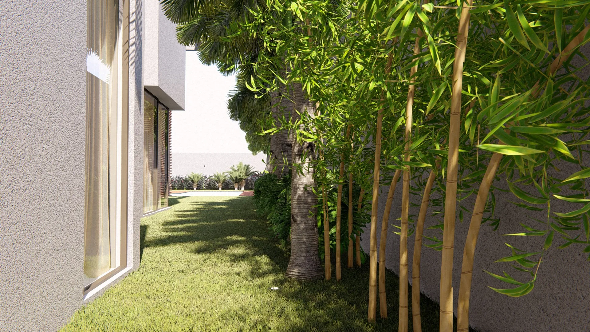 Narrow side corridor between the house and the wall, closed off by a dense bamboo hedge over the lawn