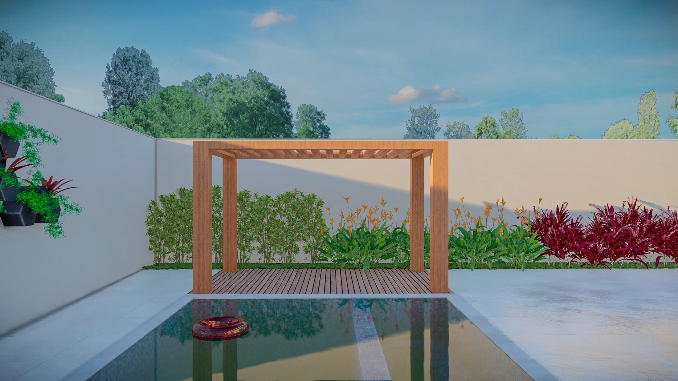 Timber pergola over a deck and mirror-like pool with a red ring float, a bamboo screen and tropical beds against the pale boundary wall