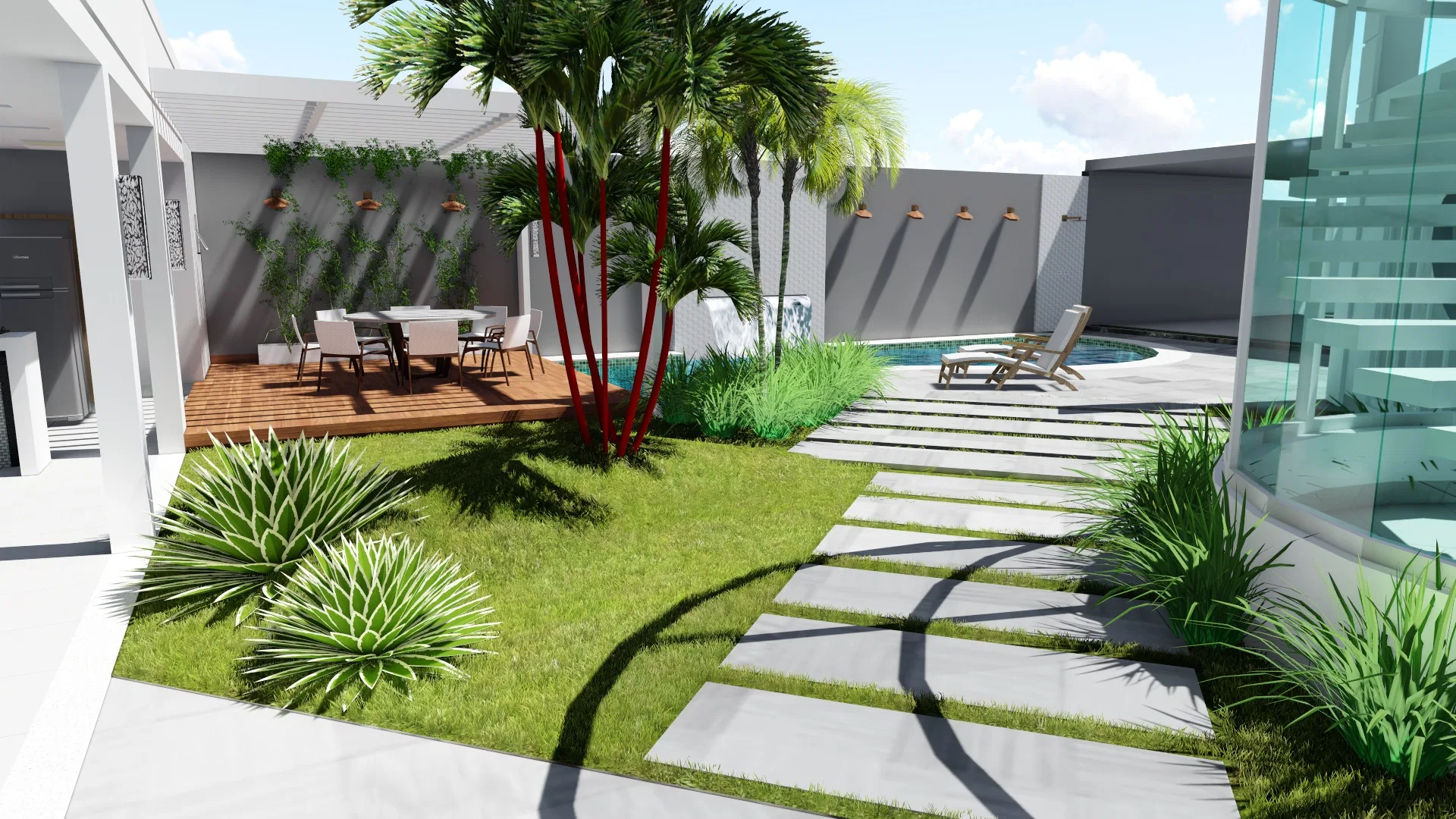 Lawn crossed by a curved stone path, sculptural agaves and a cluster of palms, with a pergola-shaded dining deck and the pool with a lounger beyond