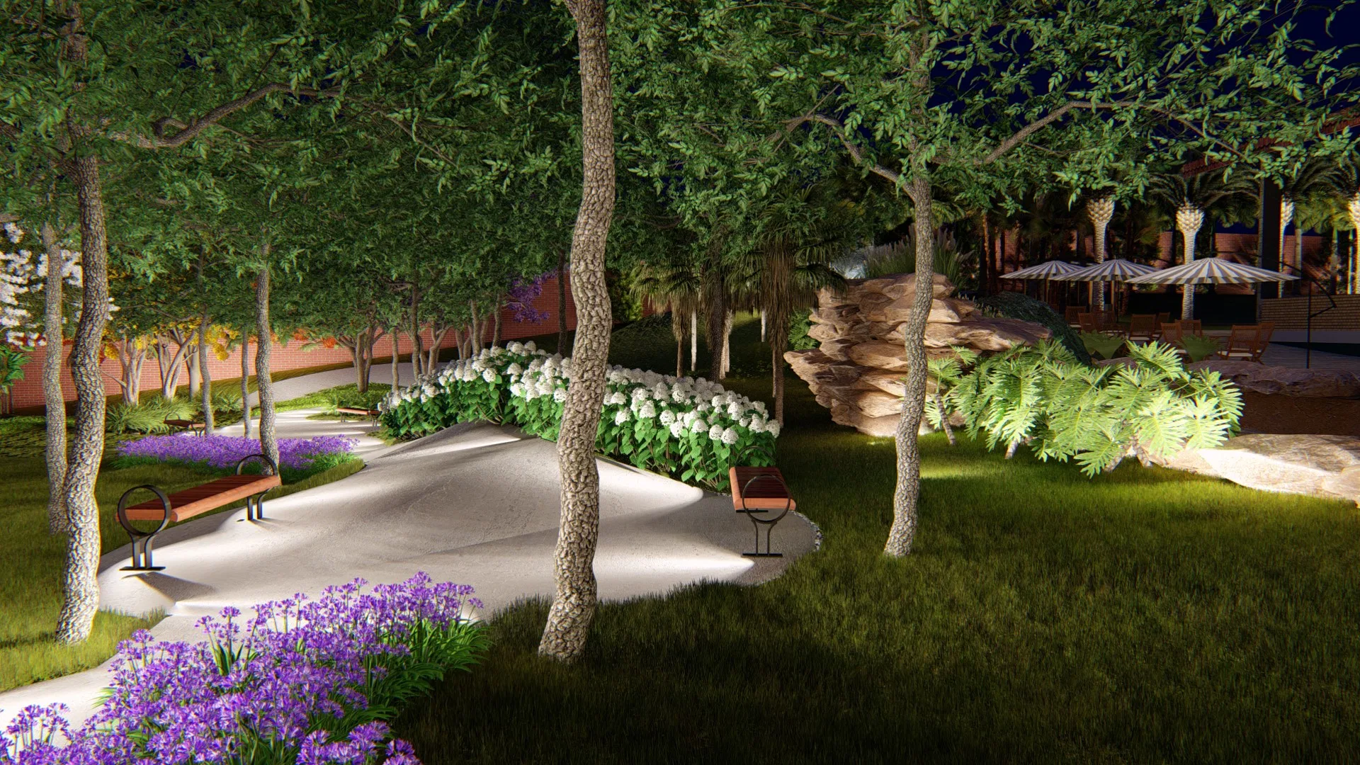 Night version of the flowering promenade, with lit trees and hydrangeas, purple agapanthus in front, timber benches and a path picked out by scenic lighting