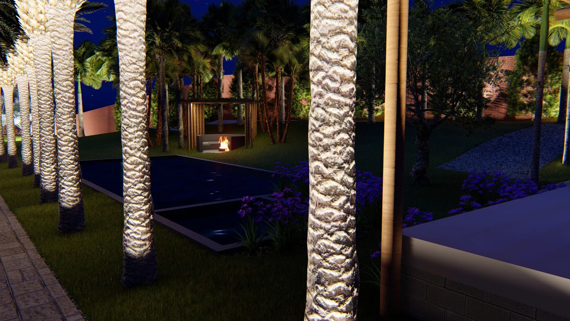 Night scene with a row of uplit palm trunks, a dark reflecting pool, a pergola with a lit fire feature and clusters of purple flowers