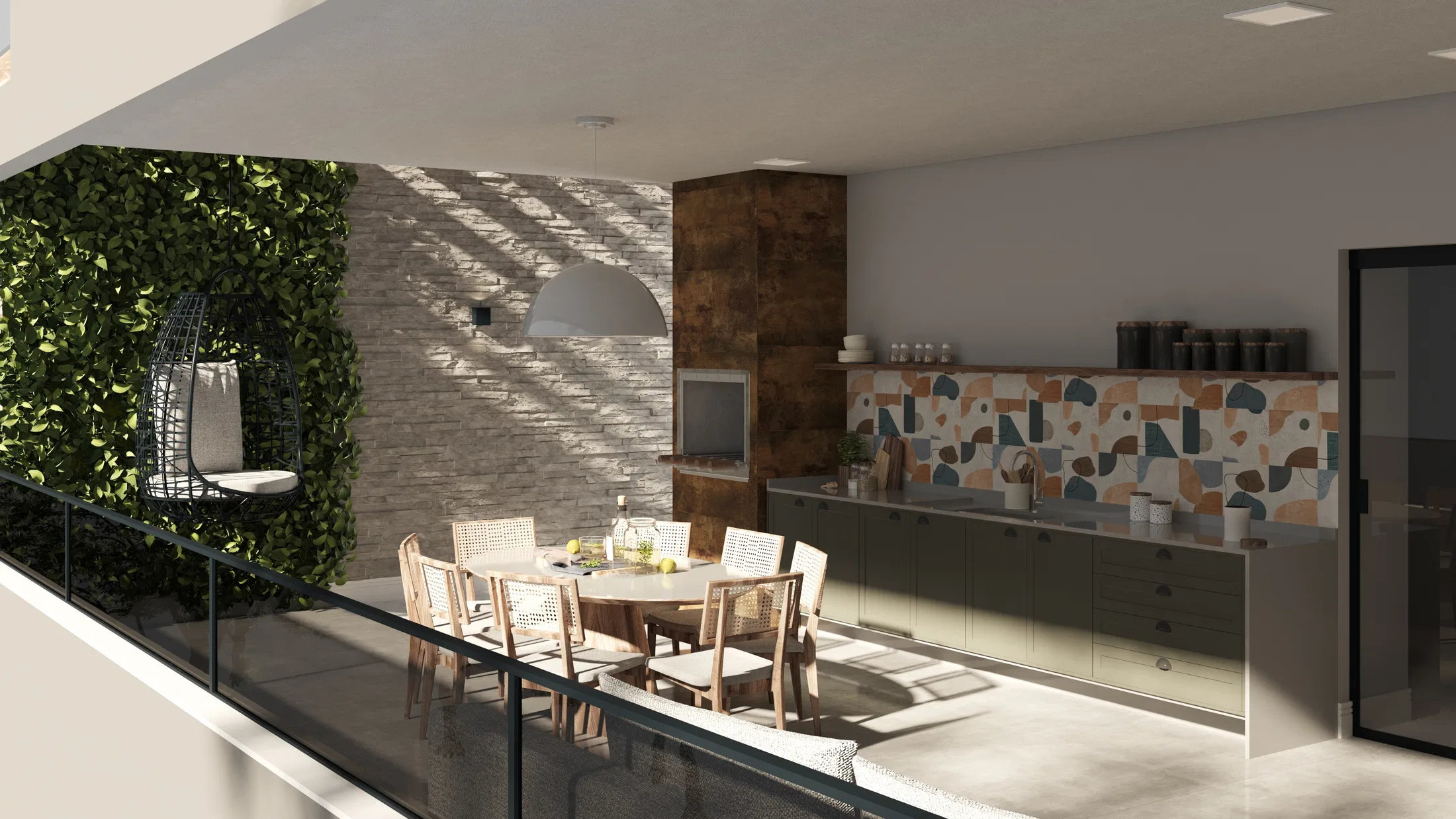 Gourmet balcony with a sofa in the foreground, a round dining table, a stone accent wall and trees visible beyond