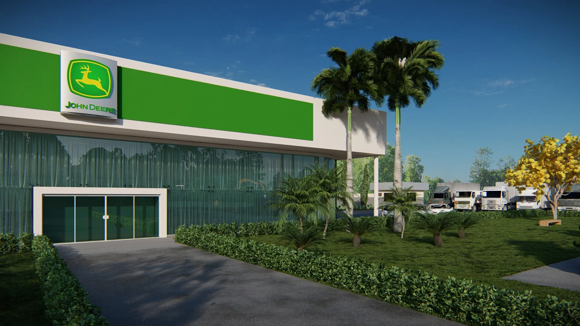 Side view of the facade with the John Deere logo, a glazed entrance, tall palm trees and a vehicle parking area in the background
