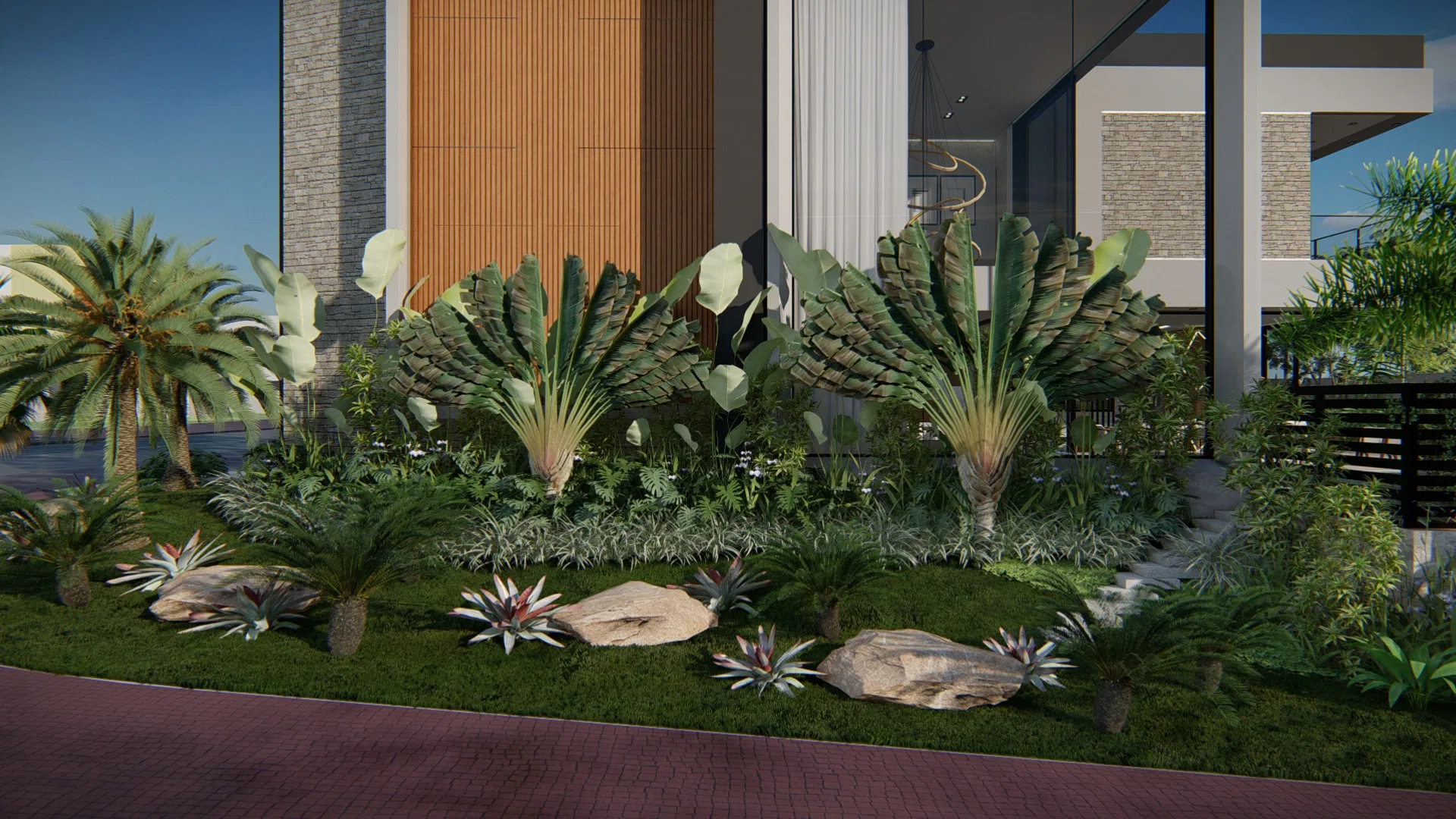 Close-up of the entrance bed with fan-leaved palms, cycads, bromeliads and rocks, set against the facade's wood-slat and stone panels.