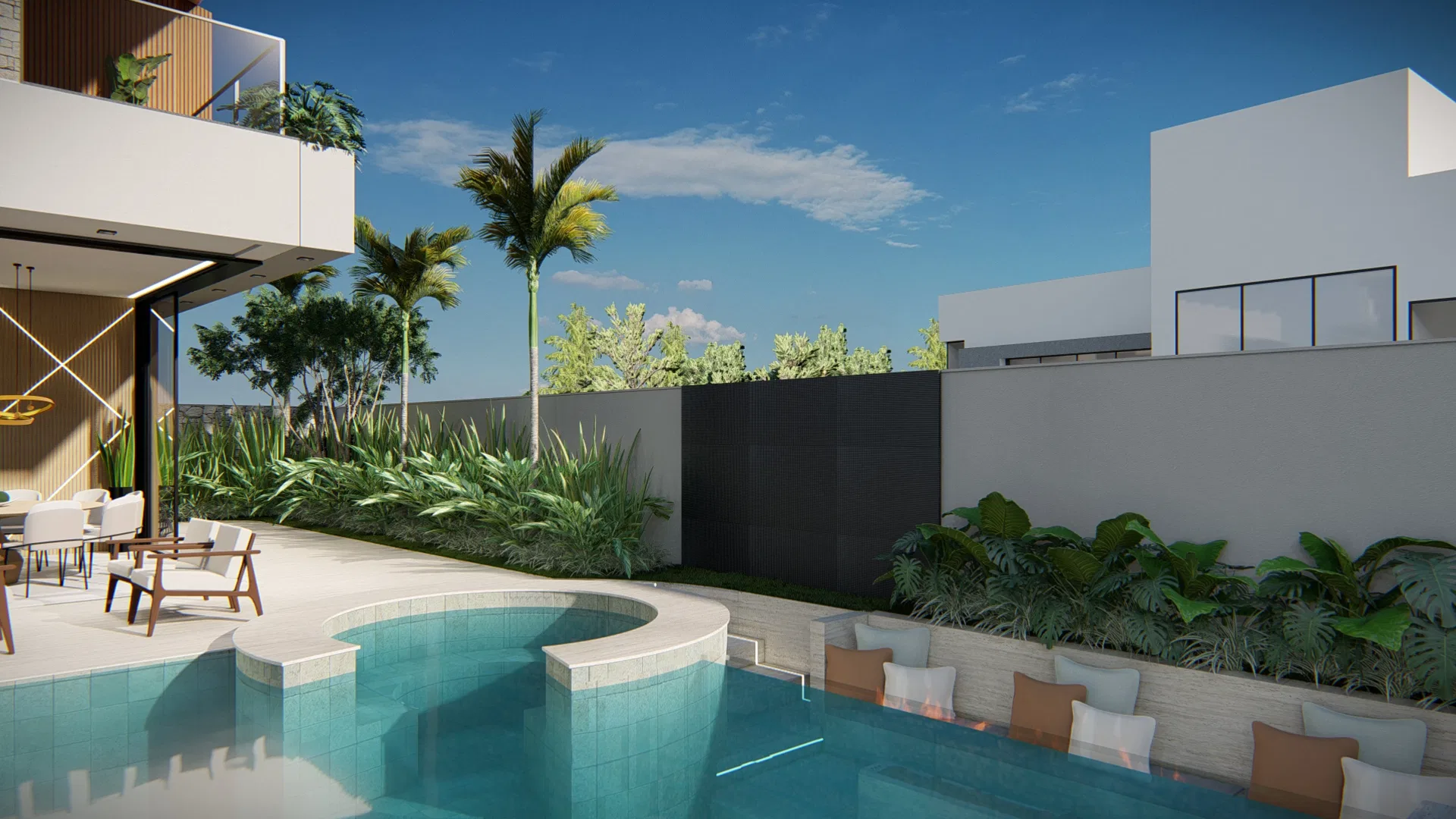 Curved blue-tiled pool with a lounge terrace beneath the house, a dark privacy wall and a planter with cushioned seating along the pool edge.