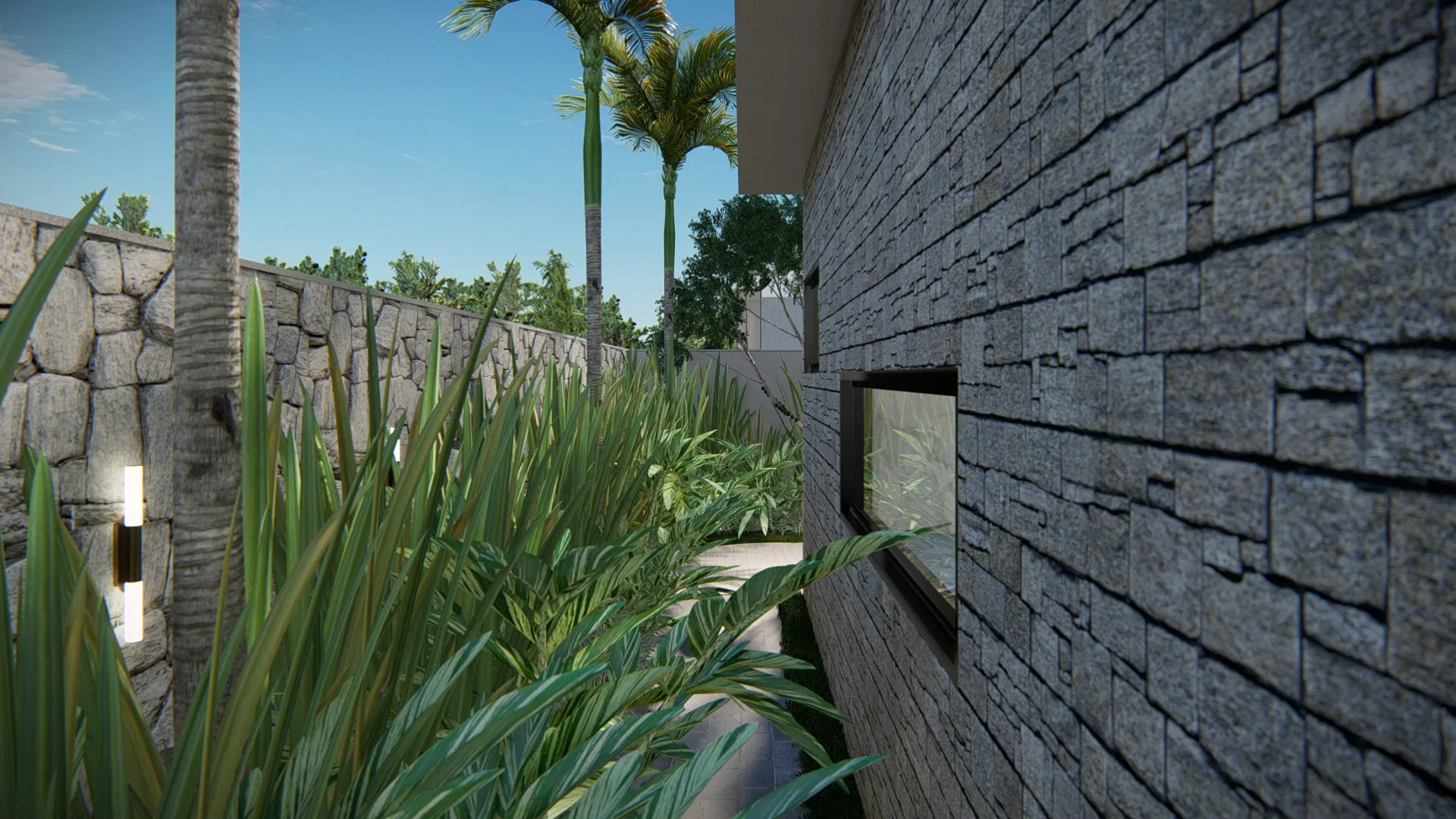 Narrow side passage with a stacked-stone wall and a lit niche, a bed of strap-leaved plants along the stone boundary wall and palm trunks.