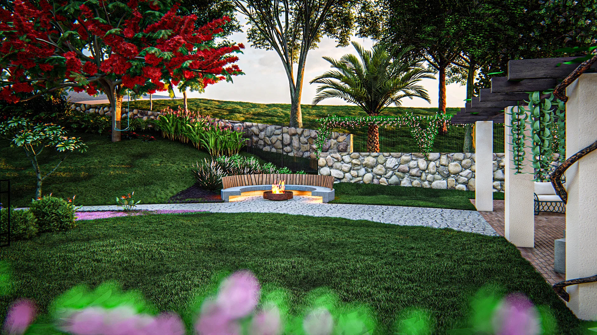 Dusk lounge with a circular fire pit and a curved bench against a rustic stone wall, under the flamboyant and palms.