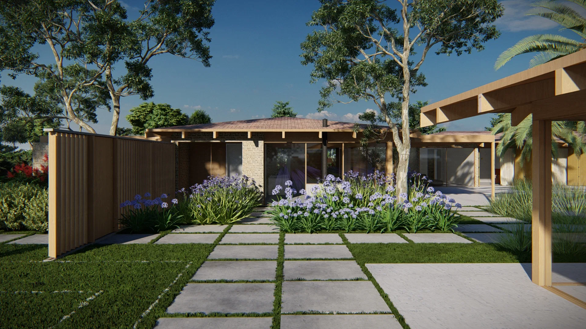 Front garden with slab paving and grass joints, beds of agapanthus and the single-storey house with slatted wood screening.