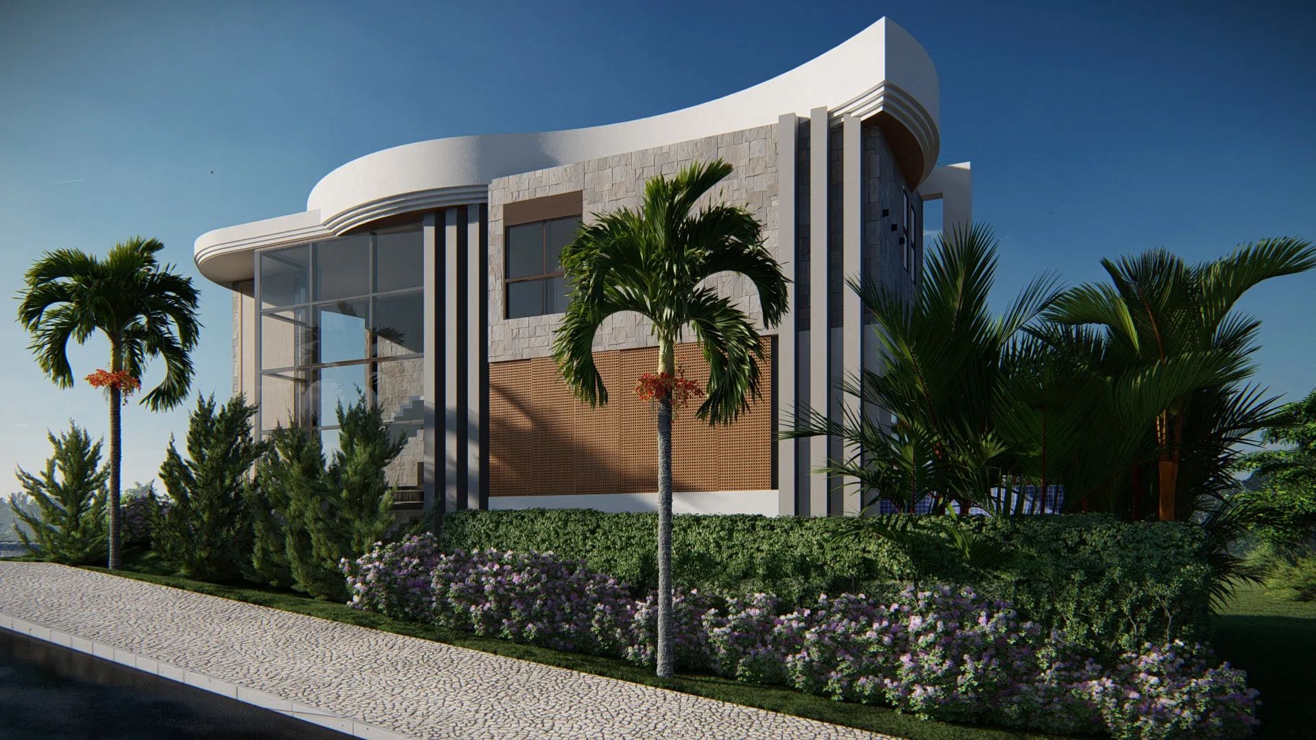Corner view of the curved house with stone cladding and glass, aligned palms and a hedge of flowering shrubs along the sidewalk