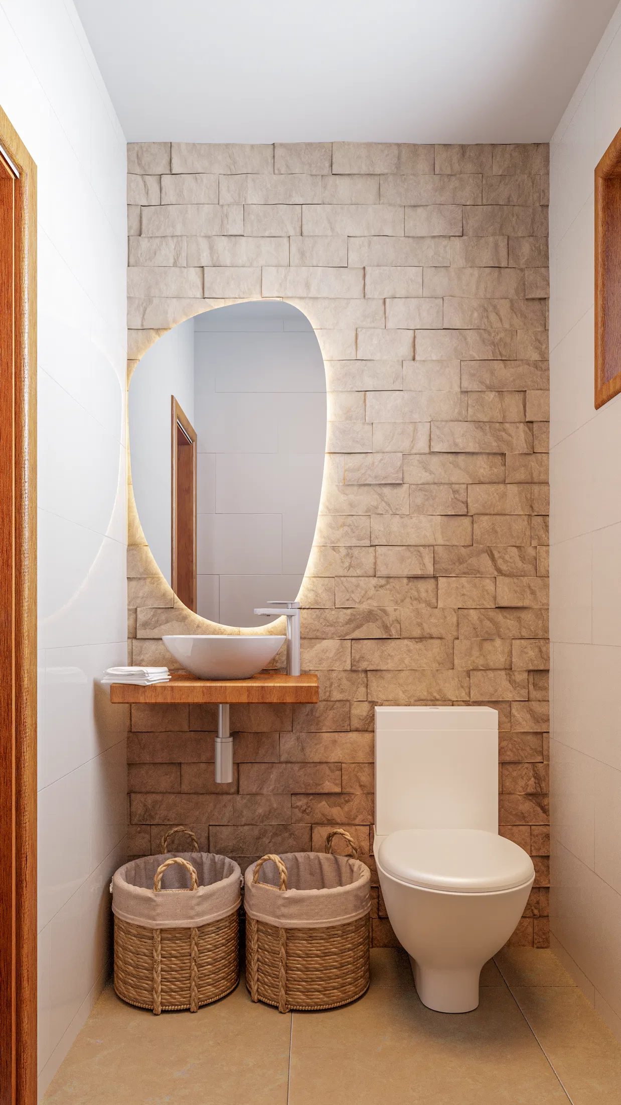 Powder room with a natural stone-clad wall, an organic backlit mirror and natural-fiber baskets
