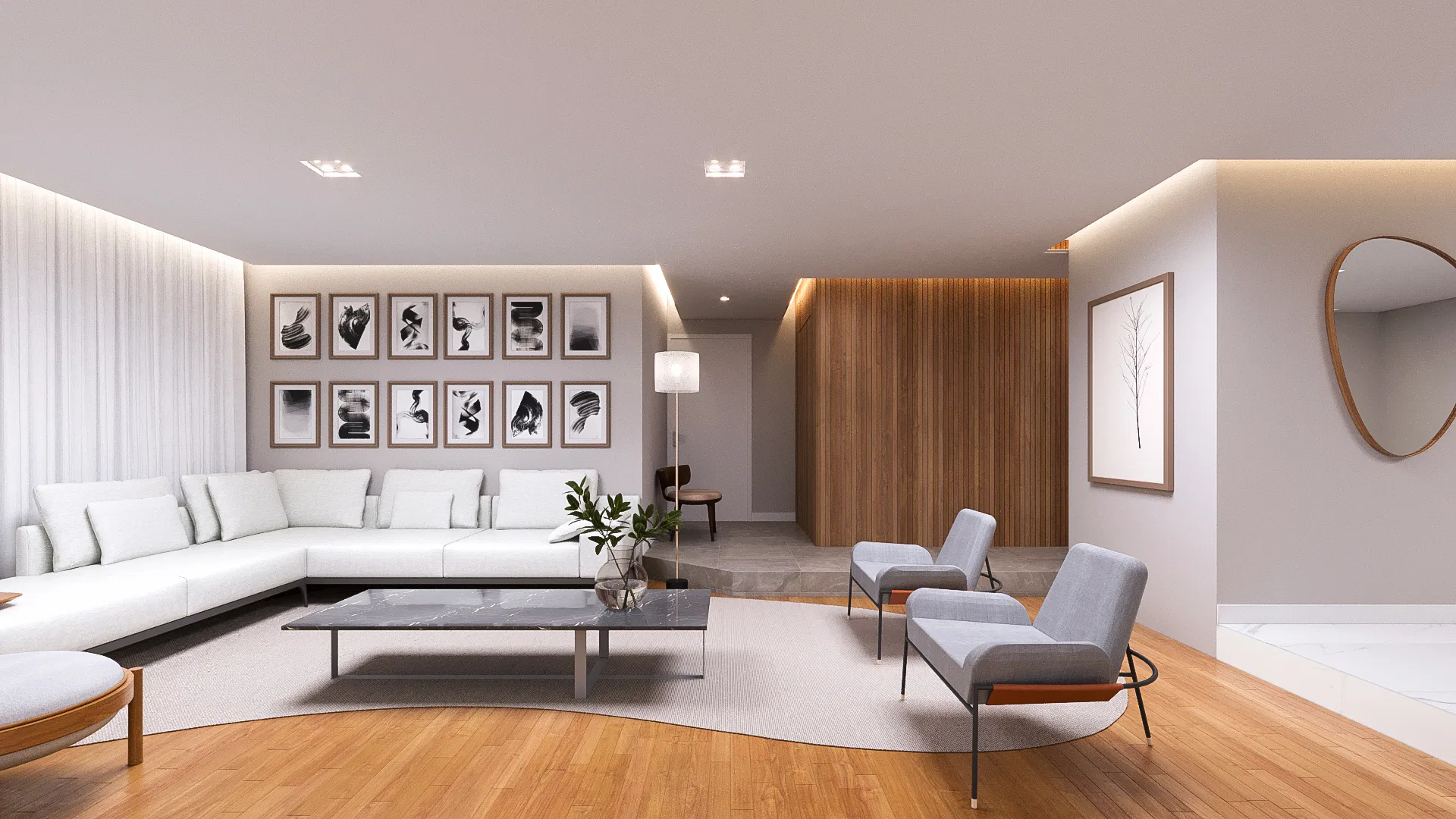 Living room with a white L-shaped sofa, a black-and-white gallery wall and a marble coffee table