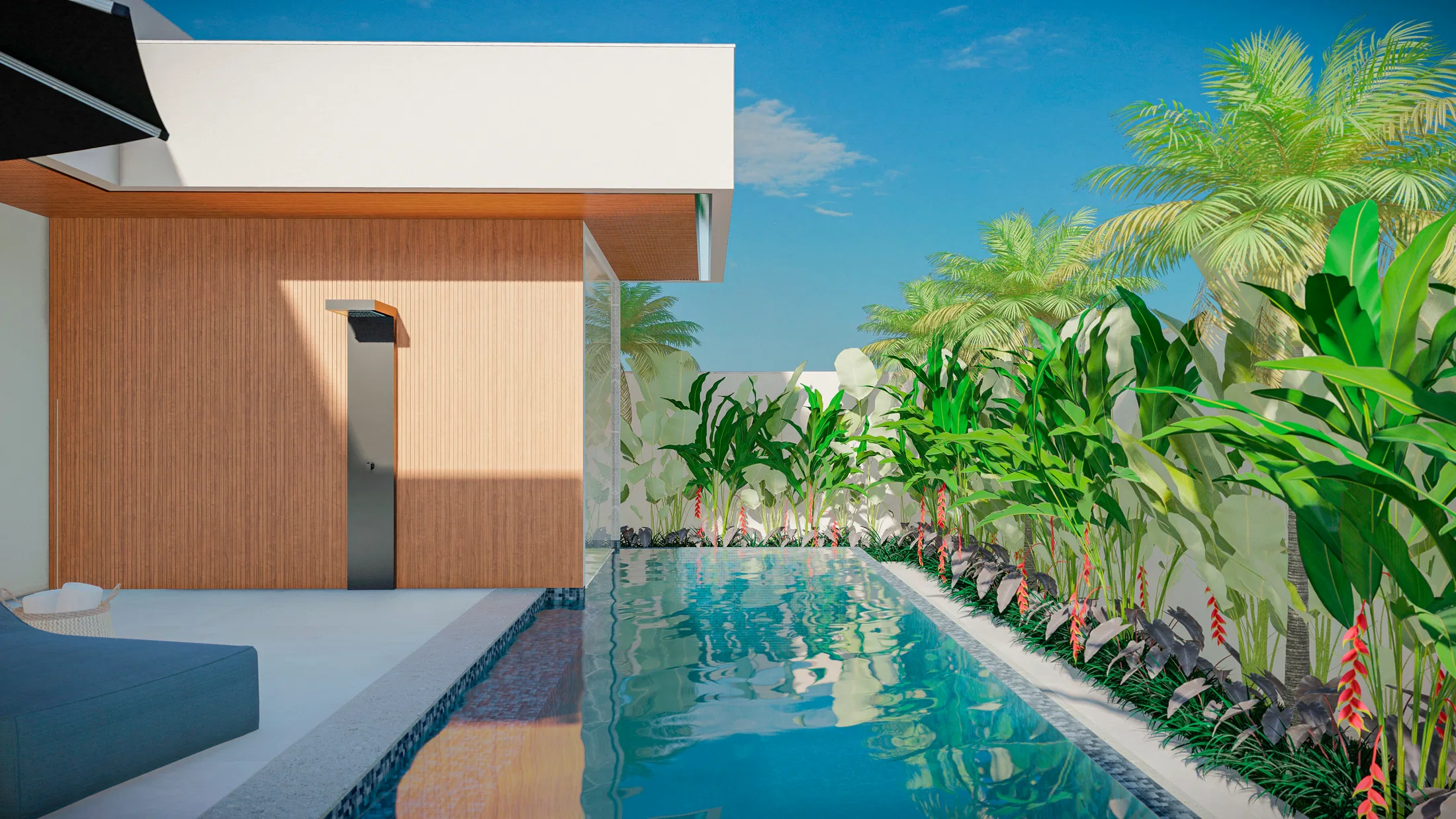 Pool along a timber wall with a water blade, a side bed of heliconias and palms and a lounger nearby