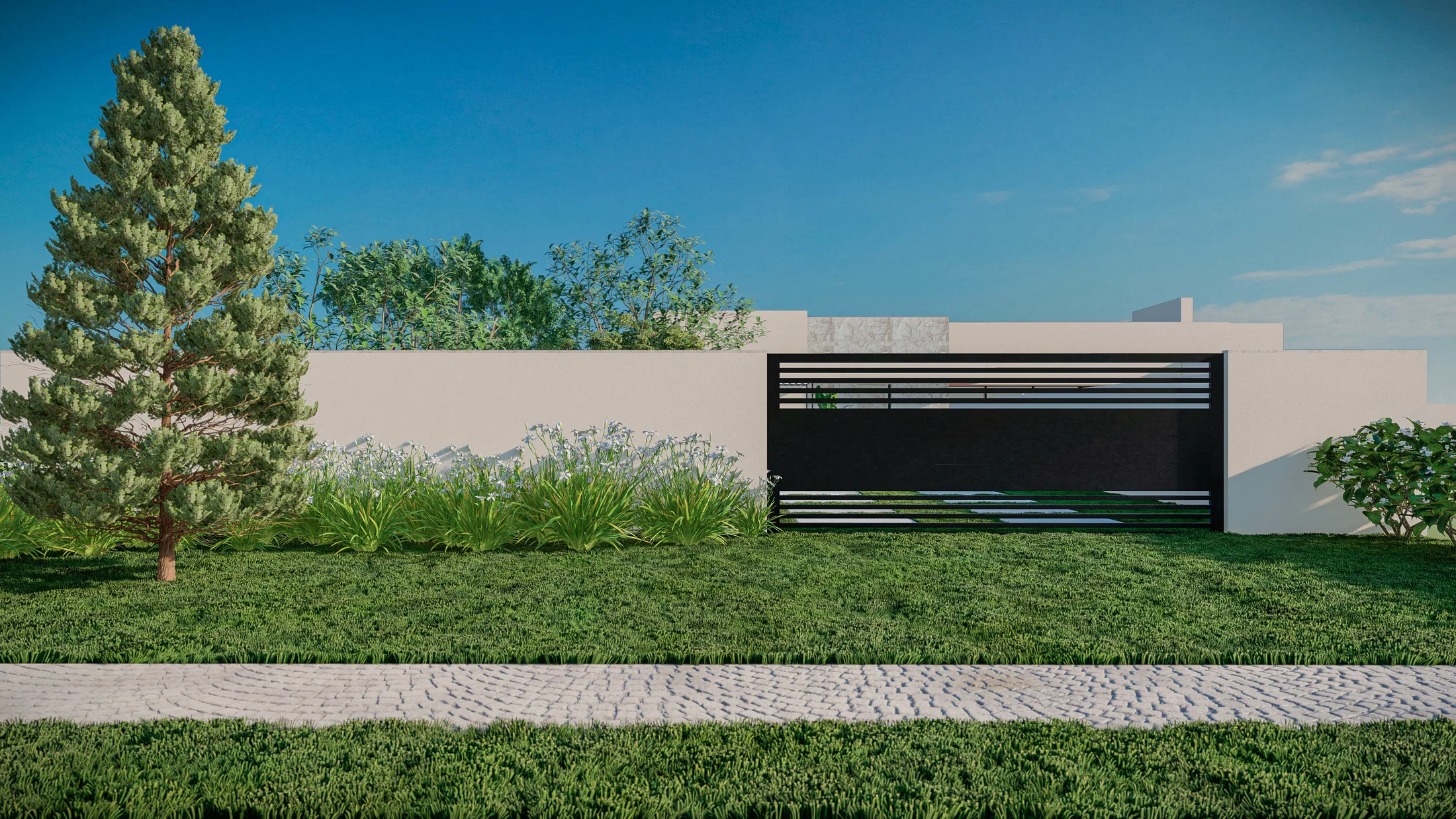 Front of the plot with a white wall and horizontal-slat gate, a pine tree, ground cover and a cobblestone strip