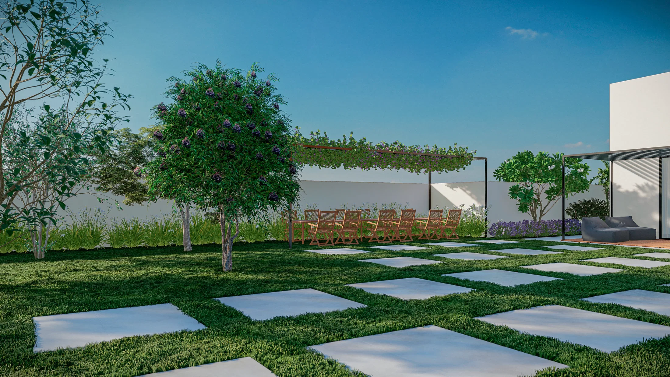 Backyard lawn with square concrete slabs, a flowering tree and a climber-covered pergola over deck loungers
