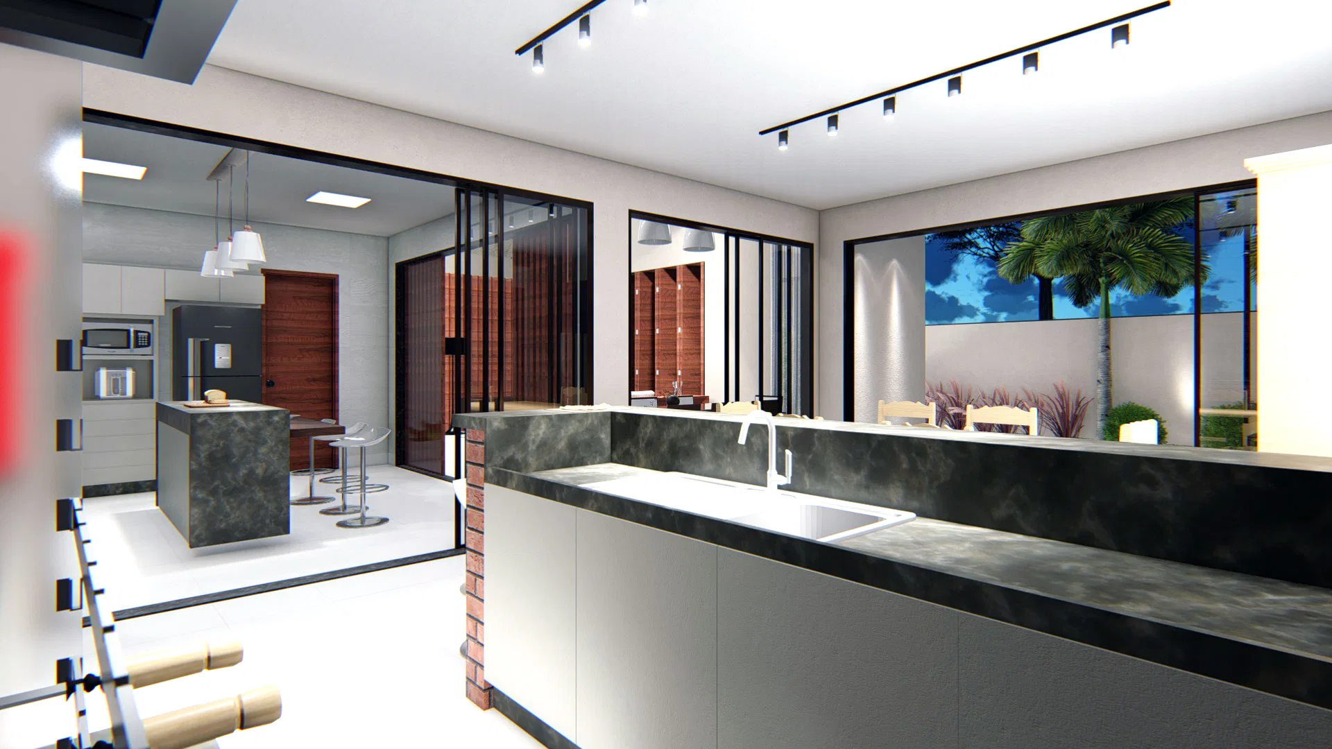 Gourmet kitchen with a dark stone island, cooktop, and a view through the window to the night garden