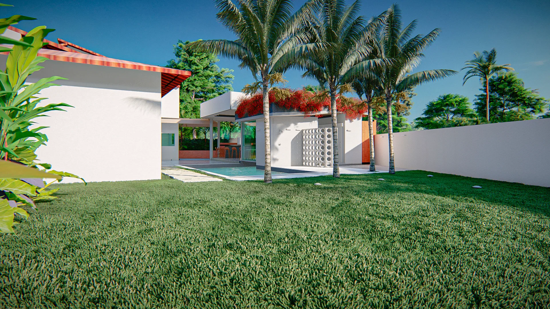 Facade of a single-story residence with a red roof, palm trees by the pool and a wide lawn in the foreground