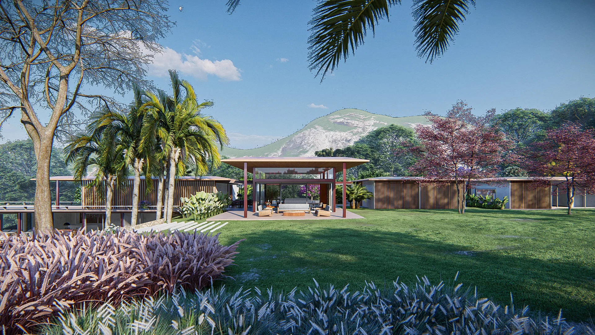 Open-air lounge pergola among palm trees, with sofas under a wood-slat roof and a mountain range visible behind.