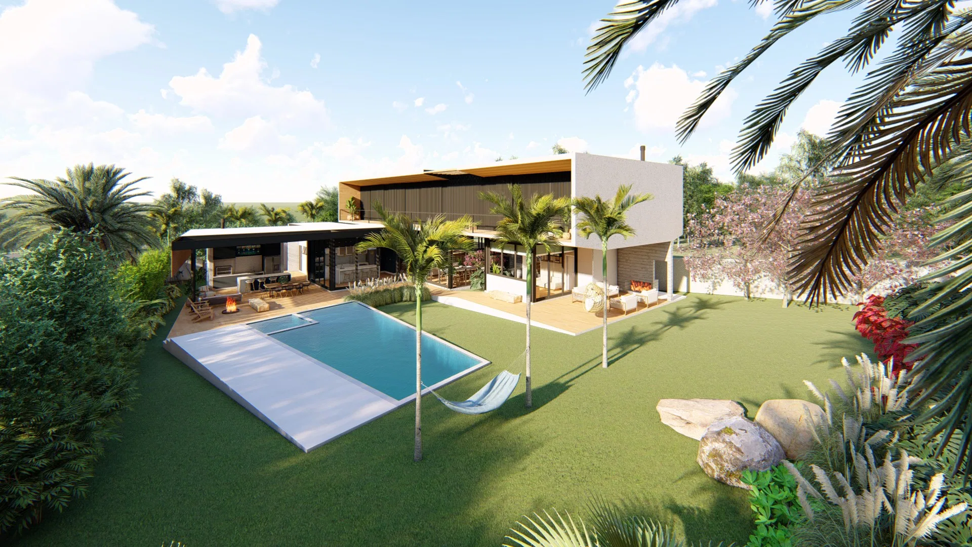 Elevated view of the backyard with the covered pool, palms, a hammock and seating, framed by palm fronds in the foreground