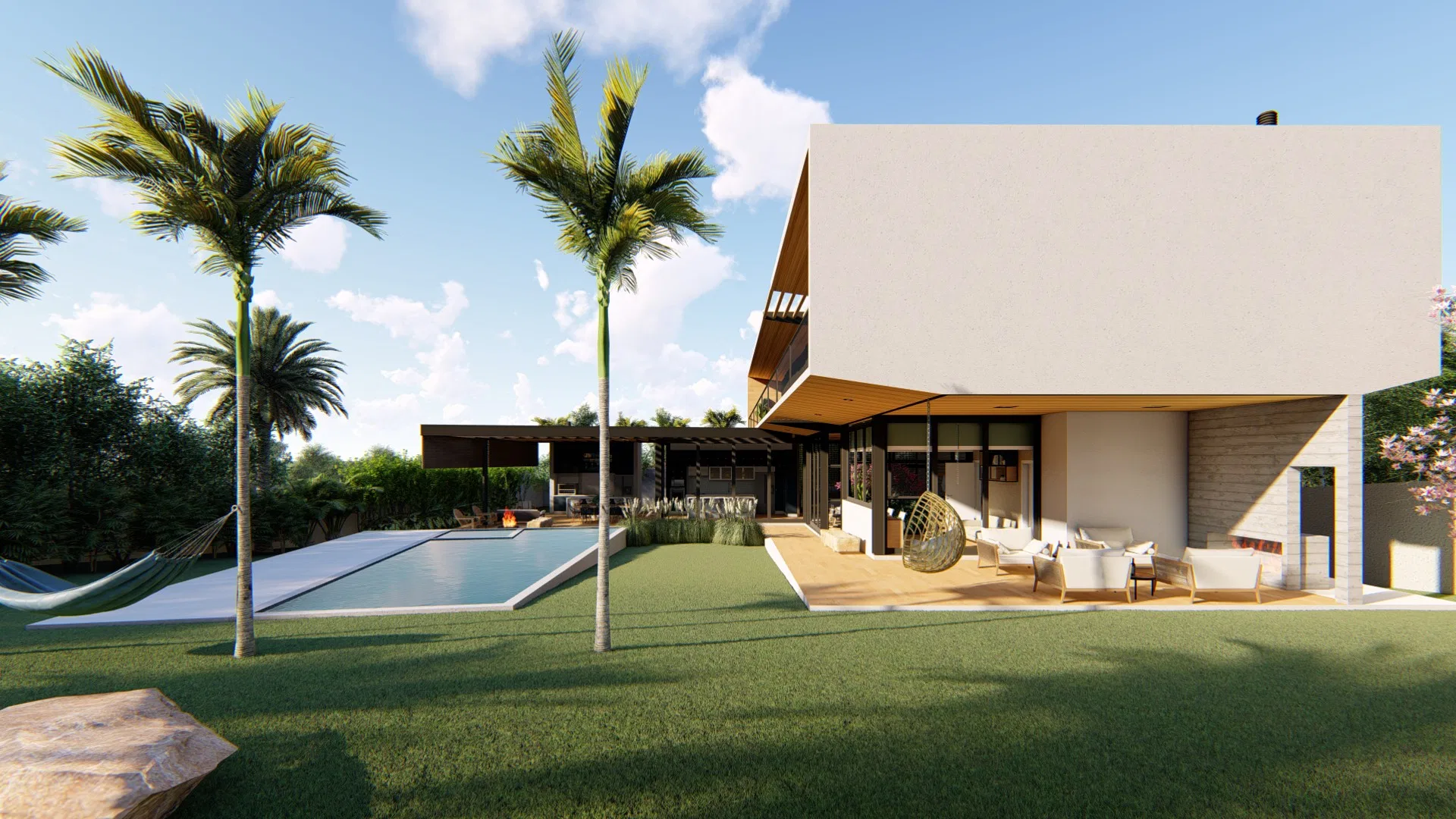 Rear of the residence with a cantilevered upper volume, a covered lounge terrace with armchairs and a hanging egg chair, a long pool and palms