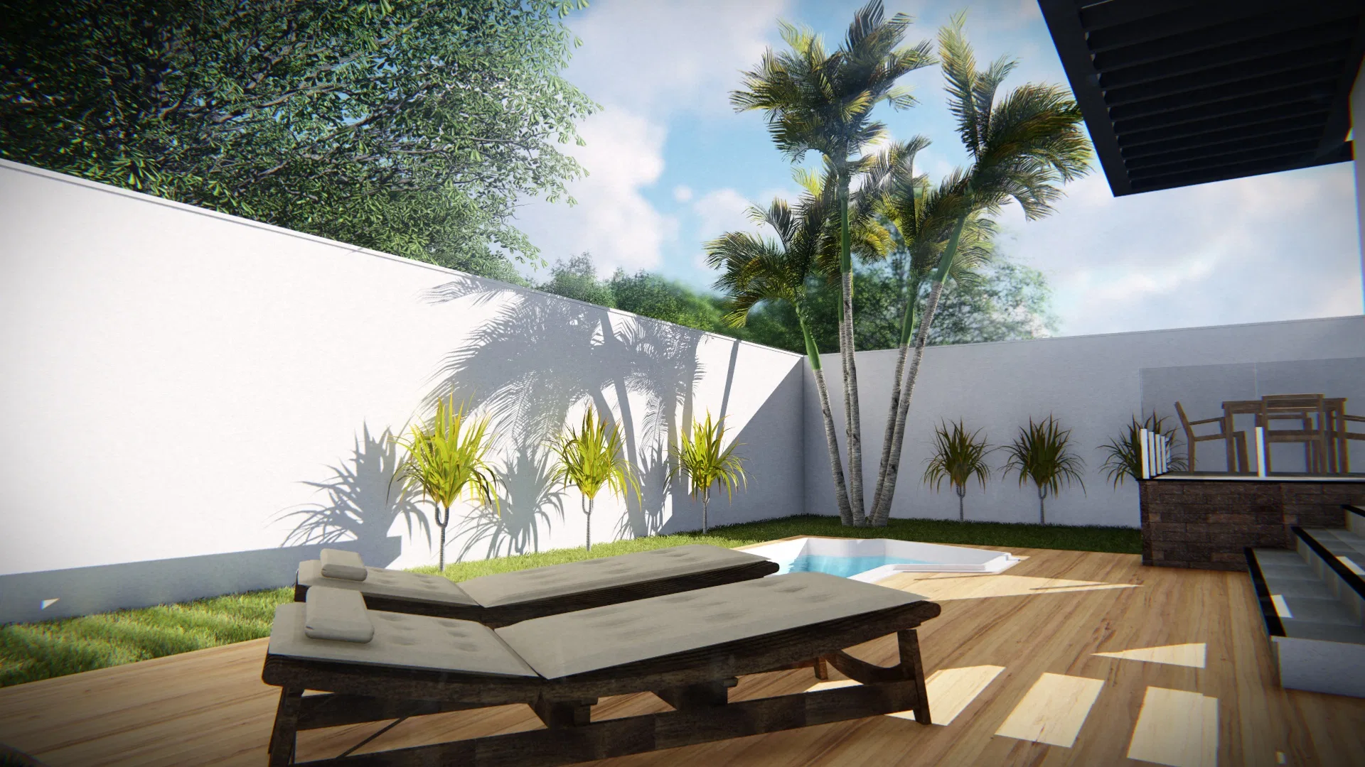 Pale wood deck with a cushioned lounger, a small pool beyond and dracaena beds against the white perimeter walls