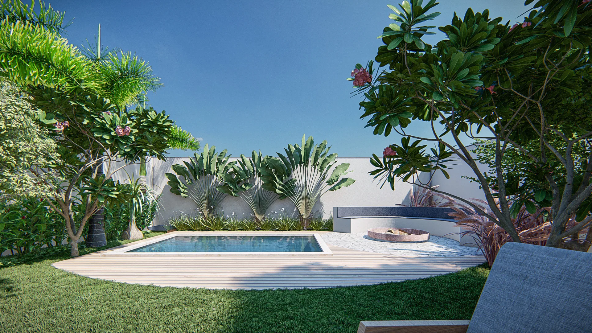 Rectangular pool framed by a white wall, palm trees and a flowering frangipani, with a wood deck and curved bench around a fire pit