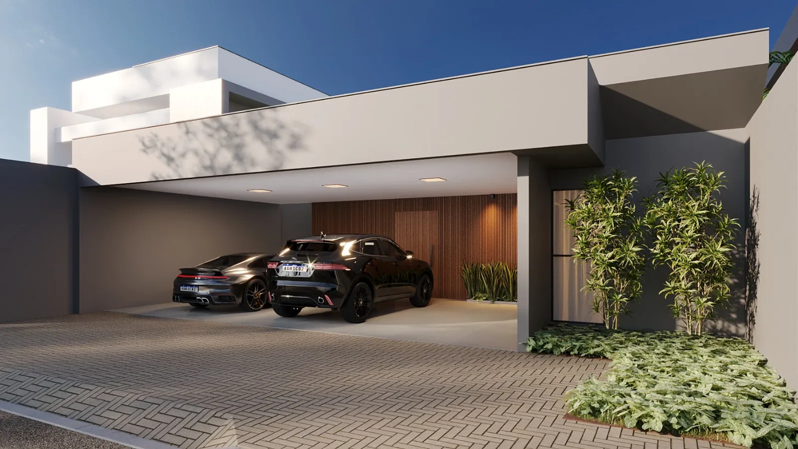 Night close-up of the garage, two sporty cars under warm light and the slatted-wood panel highlighted against the dark sky