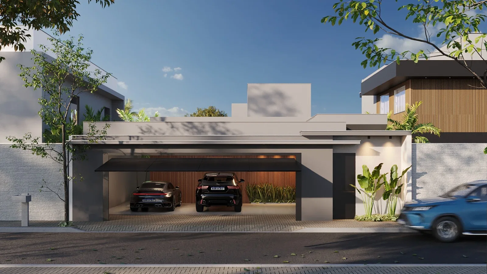 Frontal view of the covered garage, with two dark cars, a lit slatted-wood back wall and planting beds to the sides
