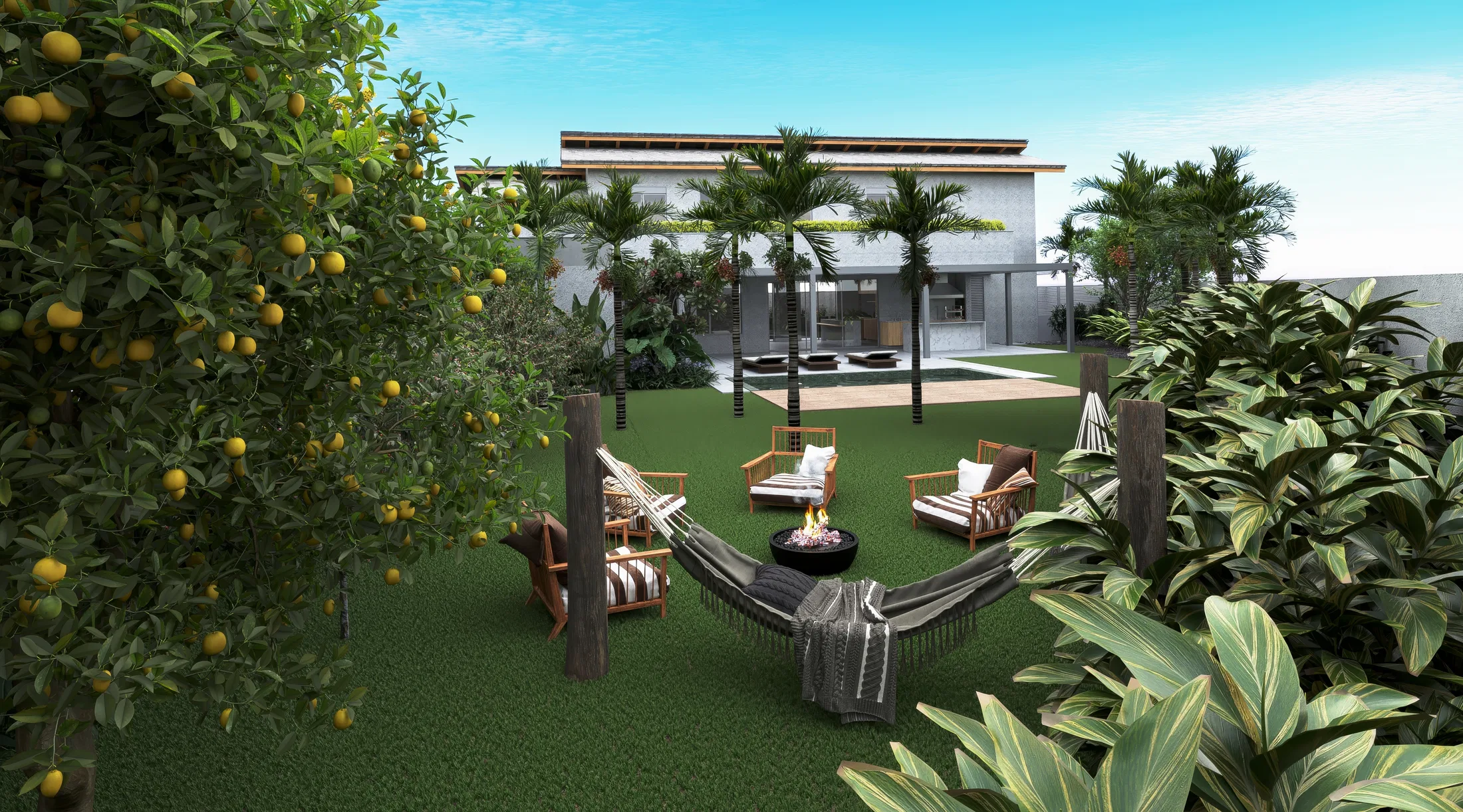 Lounge nook at the back of the garden with a hammock, armchairs around a fire bowl and palms, the house and a fruit-laden citrus tree beyond.
