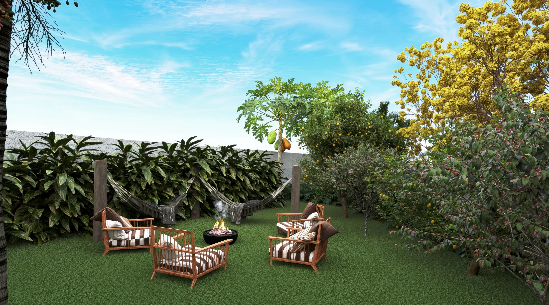 Gathering area on the lawn with hammocks and armchairs around a fire bowl, flanked by a papaya tree, citrus and a yellow-flowering tree.