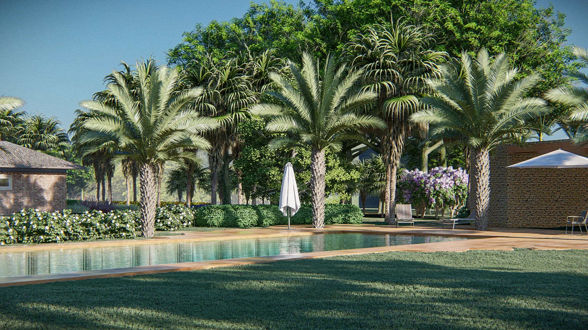 Elongated pool lined with imperial palms, a stone house on the left, an open sun umbrella and purple-flowering shrubs on the right