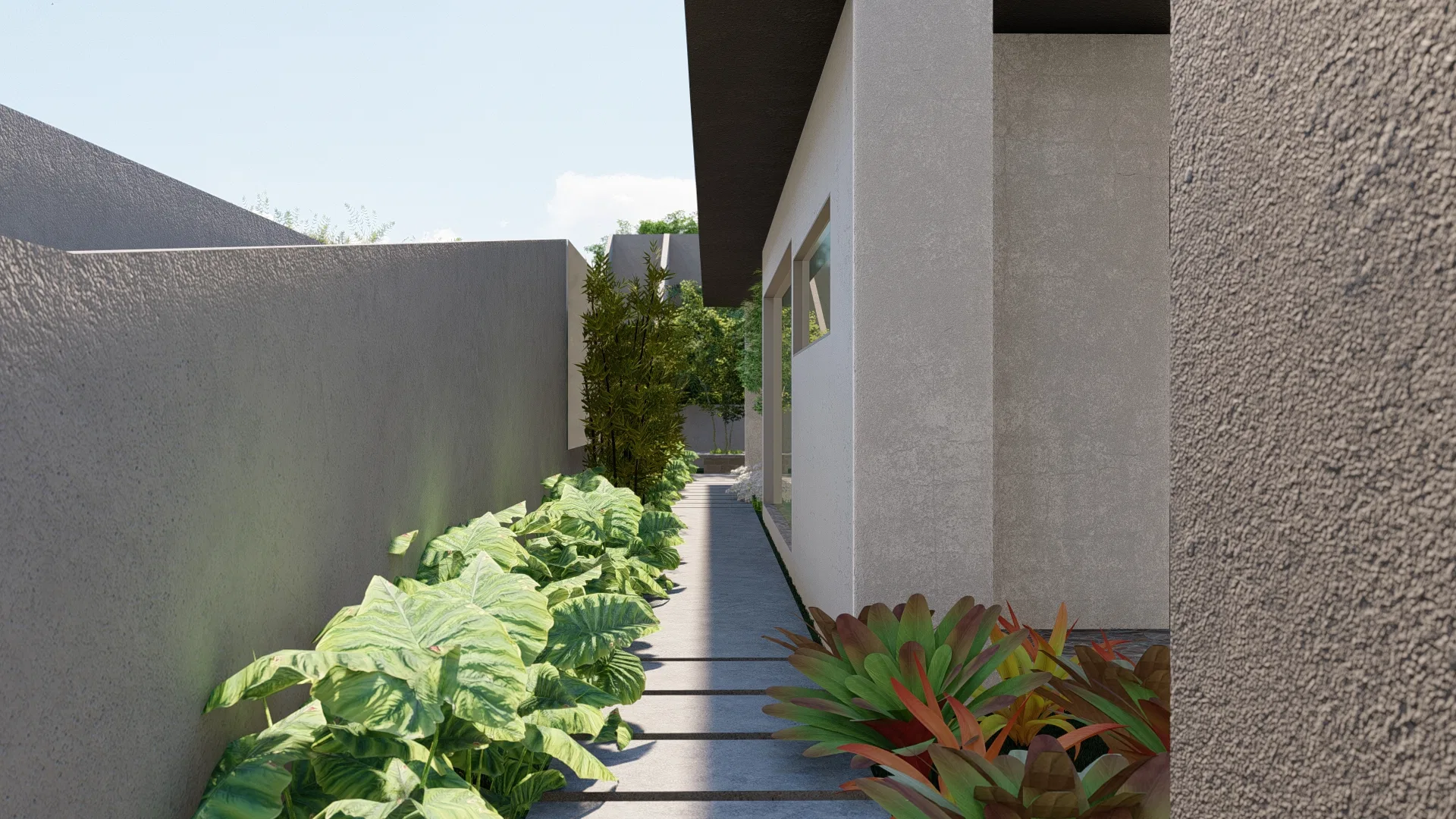 Outdoor side corridor with plank-style flooring, a bed of broad-leaved foliage on one side and colorful shrubs on the other