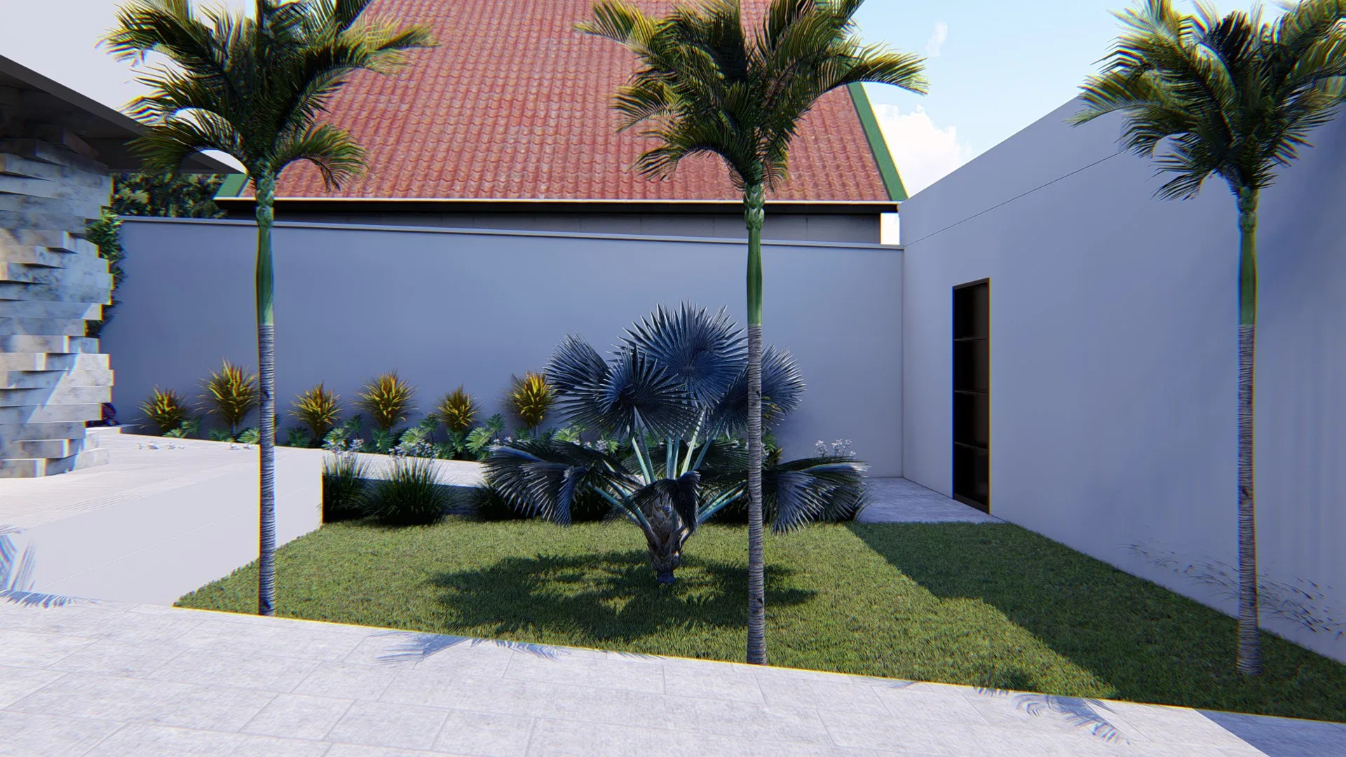 Garden corner with three palm trees along the side wall, the neighboring house's tiled roof and a bed of ornamental plants on the lawn
