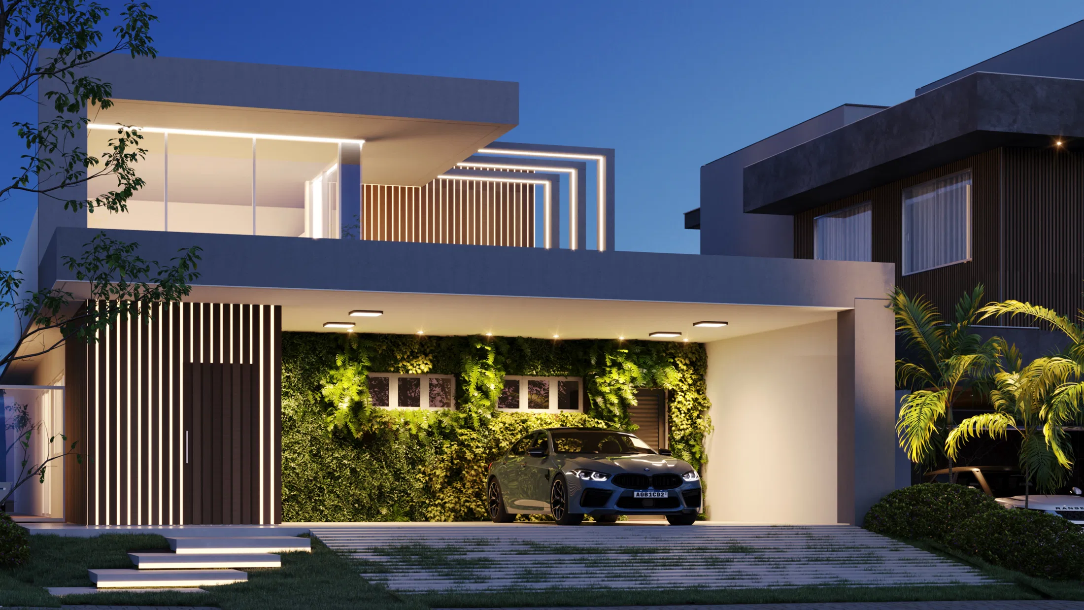 Residential facade at dusk, with interior lighting on, an illuminated vertical garden and wood slats appearing darker under the evening light
