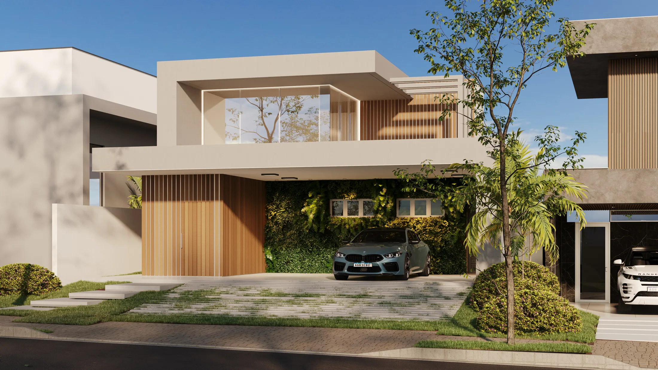 Front view of a contemporary residential facade with a glazed balcony on the upper floor, a vertical garden above the garage and a car parked at the entrance