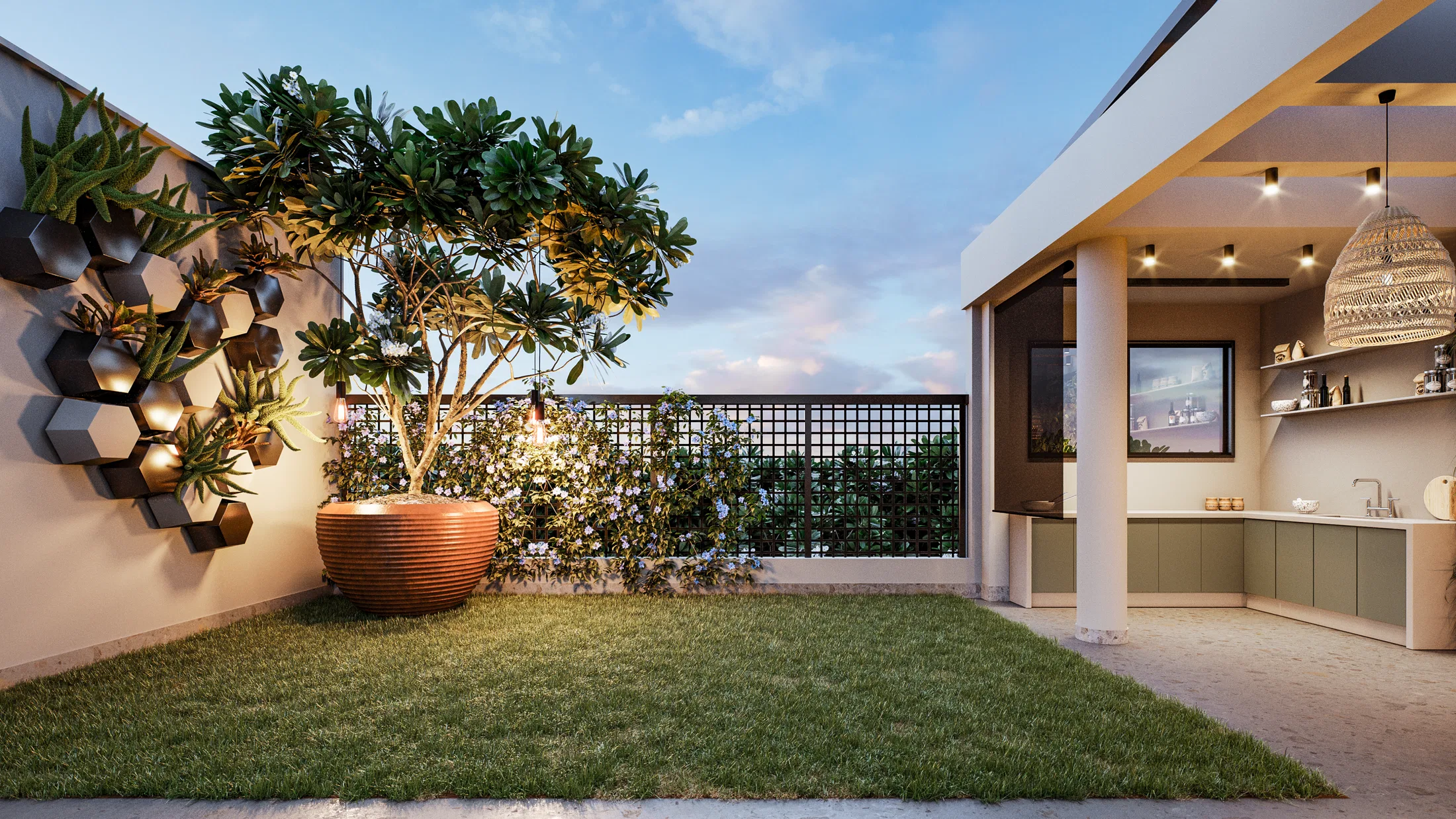 Terrace with hexagonal wall planters, a frangipani in a large terracotta pot on the lawn and an outdoor kitchen to the right.